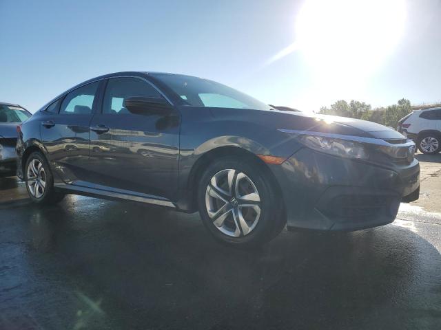 Photo 4 from auction – 2017 HONDA CIVIC LX with VIN 19XFC2F52HE038378
