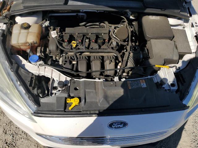 Photo 11 from auction – 2015 FORD FOCUS TITA with VIN 1FADP3N23FL221954