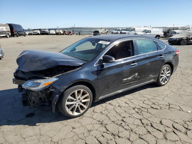 TOYOTA AVALON BAS 2014 مع رقم تعريف المركبة 4T1BK1EB2EU079928 - صورة من المزاد