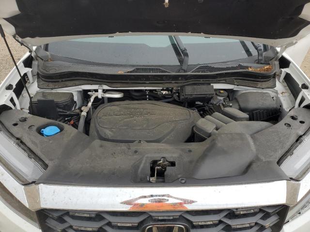 Photo 12 from auction – 2023 HONDA PASSPORT E with VIN 5FNYF8H58PB044081