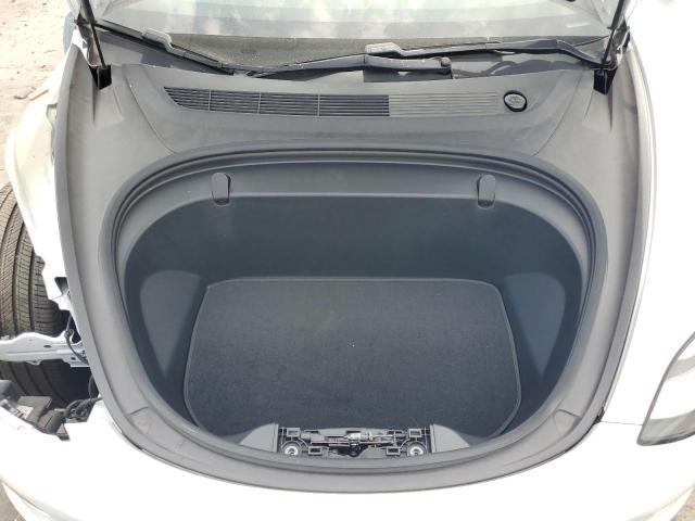 Photo 11 from auction – 2018 TESLA MODEL 3 with VIN 5YJ3E1EA8JF076218