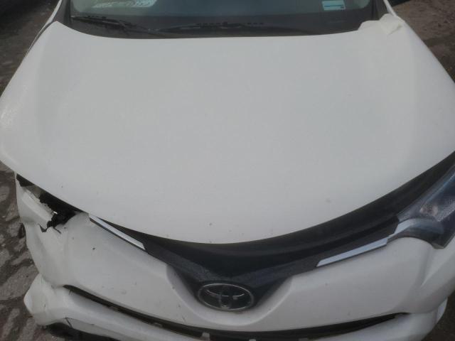 Photo 12 from auction – 2018 TOYOTA RAV4 LE with VIN JTMBFREV5JJ735522