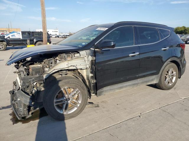 HYUNDAI SANTA FE S 2017 with VIN 5NMZU3LBXHH007706 - Photo from auction