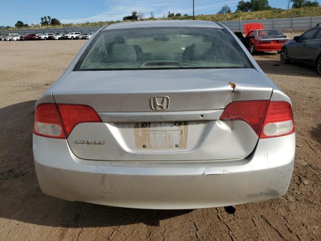Photo 6 from auction – 2011 HONDA CIVIC LX with VIN 19XFA1E5XBE038685