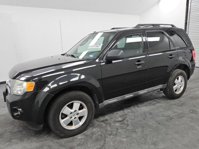 FORD ESCAPE XLT 2011 with VIN 1FMCU0D79BKA73931 - Photo from auction