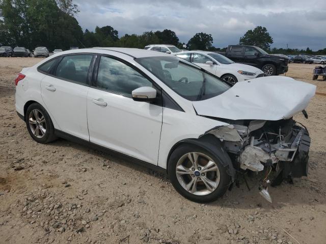 Foto 4 de la subasta – 2014 FORD FOCUS SE con VIN 1FADP3F21EL377570