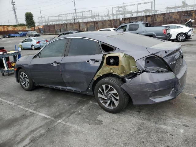 Photo 2 from auction – 2017 HONDA CIVIC EX with VIN 2HGFC2F74HH531695