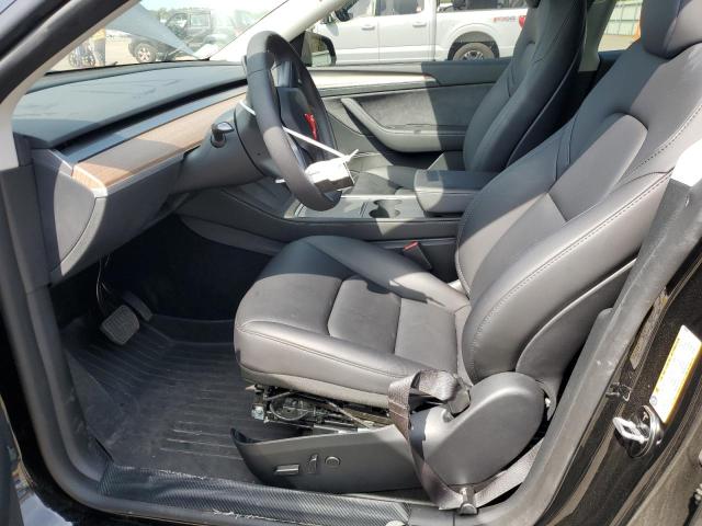 Photo 7 from auction – 2023 TESLA MODEL Y with VIN 7SAYGAEE1PF909386