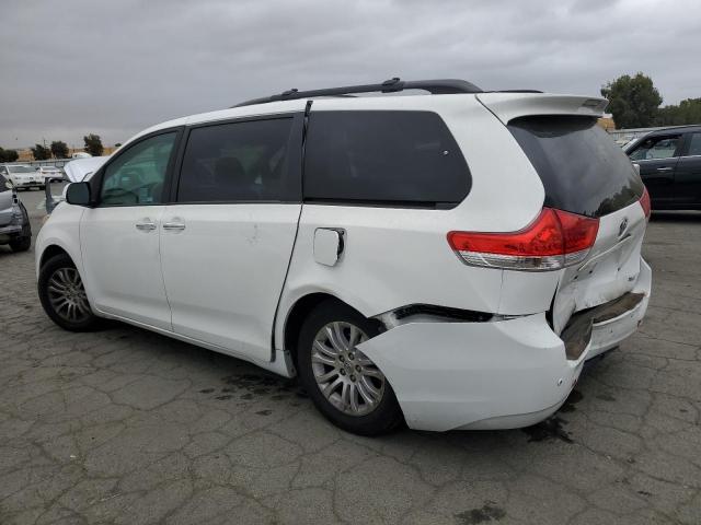 Photo 2 from auction – 2014 TOYOTA SIENNA XLE with VIN 5TDYK3DC1ES409129