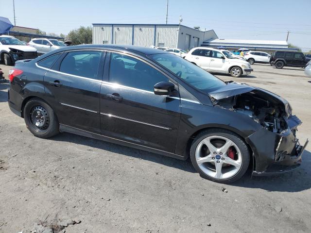 Photo 4 from auction – 2014 FORD FOCUS TITA with VIN 1FADP3J22EL156793
