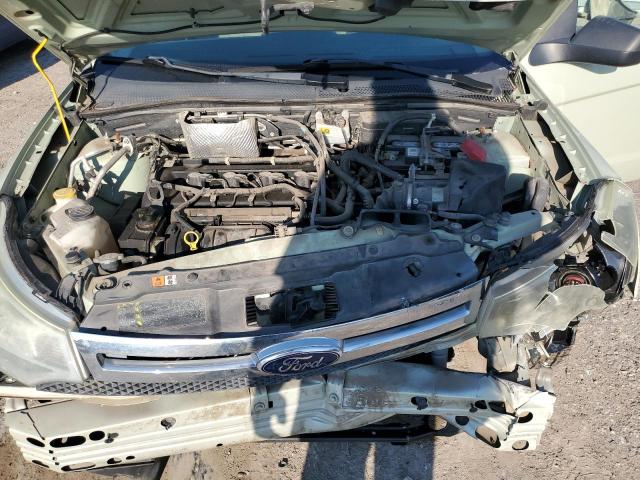 Photo 11 from auction – 2011 FORD FOCUS SE with VIN 1FAHP3FN7BW130351