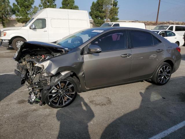 TOYOTA COROLLA L 2018 with VIN 5YFBURHEXJP798628 - Photo from auction
