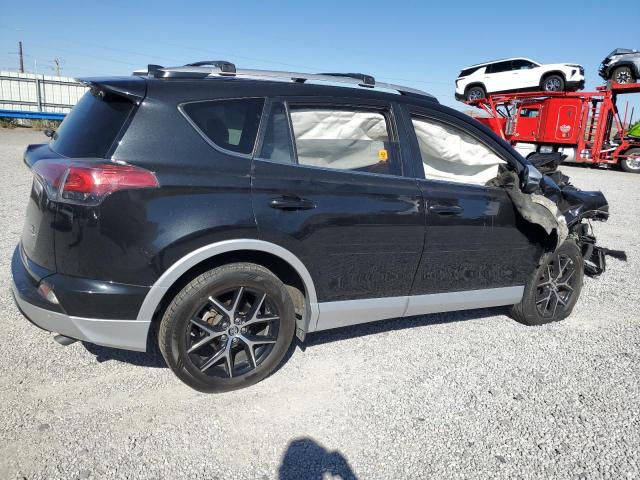 Photo 3 from auction – 2016 TOYOTA RAV4 SE with VIN JTMJFREV2GD184291