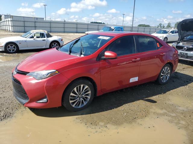 TOYOTA COROLLA L 2019 with VIN 2T1BURHE2KC209072 - Photo from auction