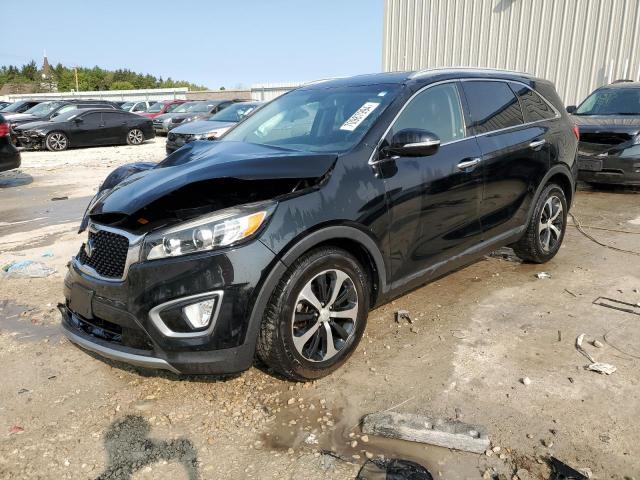 KIA SORENTO EX 2016 with VIN 5XYPH4A11GG045426 - Photo from auction