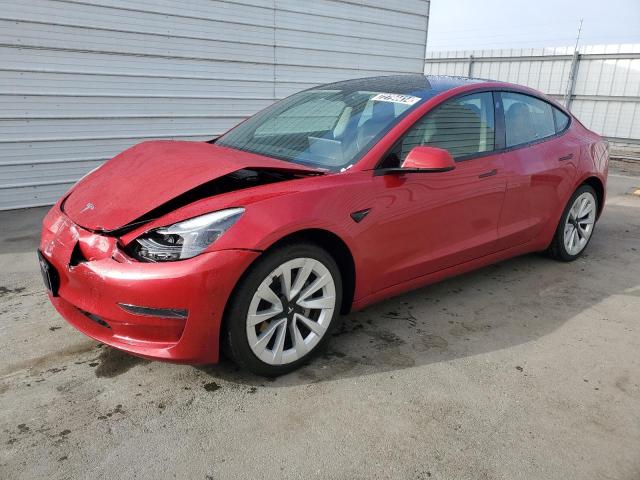 TESLA MODEL 3 2022 with VIN 5YJ3E1EA5NF303869 - Photo from auction