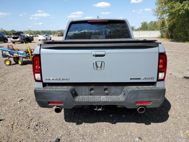 Photo 6 from auction – 2023 HONDA RIDGELINE with VIN 5FPYK3F75PB502153