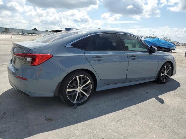 Photo 3 from auction – 2022 HONDA CIVIC TOUR with VIN 2HGFE1F99NH316640