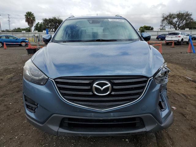 Photo 5 from auction – 2016 MAZDA CX-5 GT with VIN JM3KE2DY2G0734503