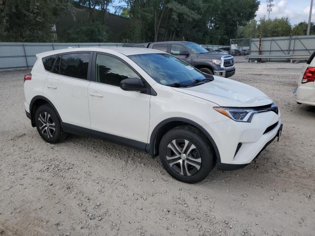Photo 4 from auction – 2018 TOYOTA RAV4 LE with VIN JTMBFREV2JJ721027