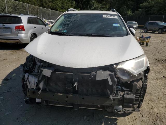 Photo 5 from auction – 2016 TOYOTA RAV4 XLE with VIN 2T3RFREV6GW438946