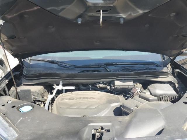 Photo 12 from auction – 2022 HONDA PASSPORT E with VIN 5FNYF8H59NB024452