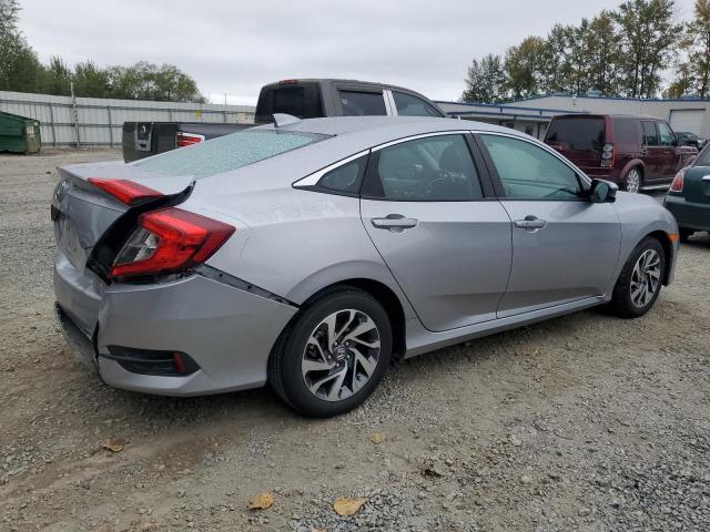Photo 3 from auction – 2018 HONDA CIVIC EX with VIN 2HGFC2F70JH602431