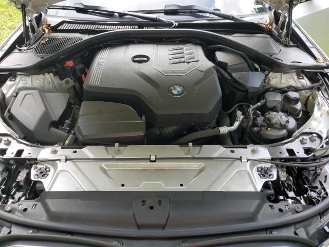 Photo 11 from auction – 2023 BMW 330I with VIN 3MW69FF00P8D72395
