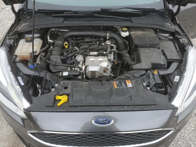 Photo 11 from auction – 2018 FORD FOCUS SE with VIN 1FADP3FE6JL243349