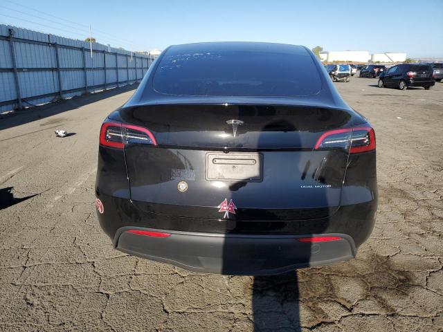 Photo 6 from auction – 2023 TESLA MODEL Y with VIN 7SAYGAEE7PF891413