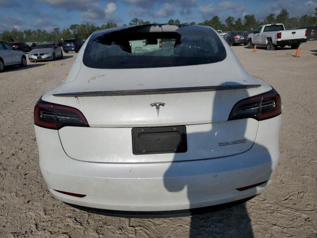 Photo 6 from auction – 2021 TESLA MODEL 3 with VIN 5YJ3E1ECXMF044795