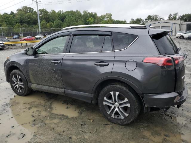 Photo 2 from auction – 2016 TOYOTA RAV4 LE with VIN JTMZFREV1GJ093923