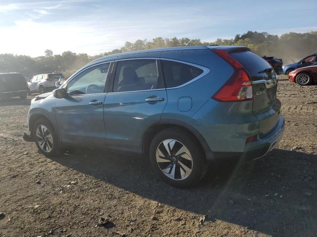 Photo 2 from auction – 2015 HONDA CR-V TOURI with VIN 5J6RM4H98FL019340