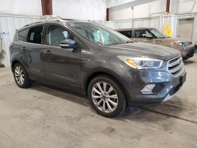 Photo 4 from auction – 2017 FORD ESCAPE TIT with VIN 1FMCU9J94HUA03034