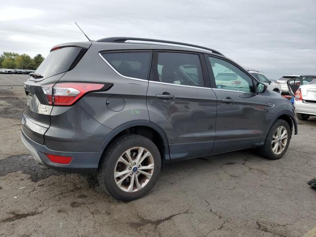 Photo 3 from auction – 2018 FORD ESCAPE SE with VIN 1FMCU9GDXJUB02572