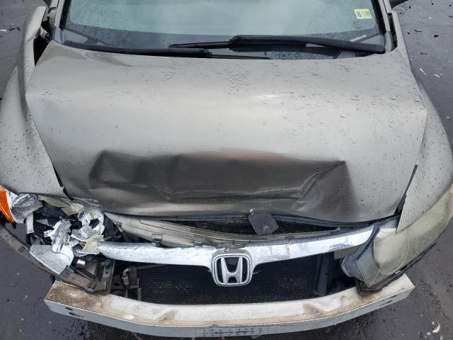 Photo 11 from auction – 2006 HONDA CIVIC LX with VIN 1HGFA16596L064322