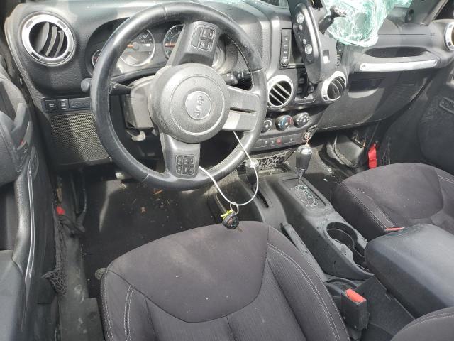 Photo 8 from auction – 2014 JEEP WRANGLER U with VIN 1C4BJWFG7EL111311