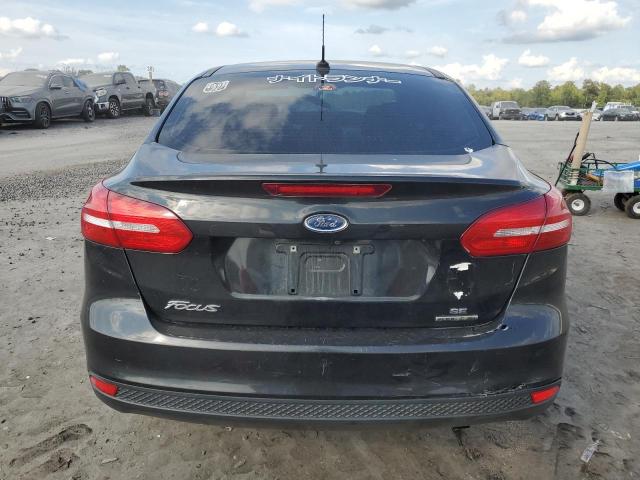 Photo 6 from auction – 2015 FORD FOCUS SE with VIN 1FADP3F24FL240947