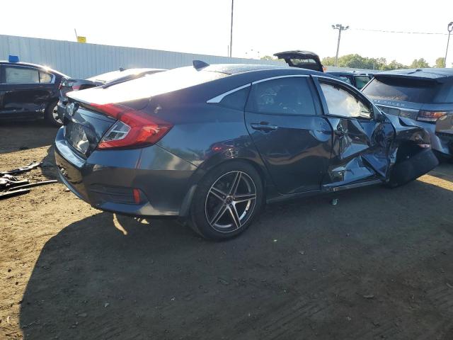 Photo 3 from auction – 2018 HONDA CIVIC EX with VIN 2HGFC2F74JH584726