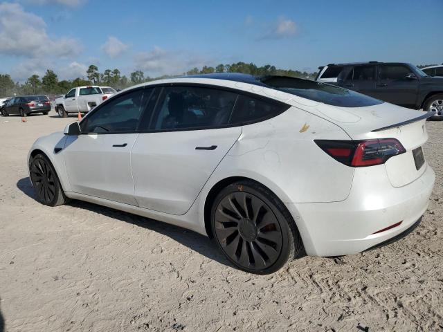 Photo 2 from auction – 2021 TESLA MODEL 3 with VIN 5YJ3E1ECXMF044795