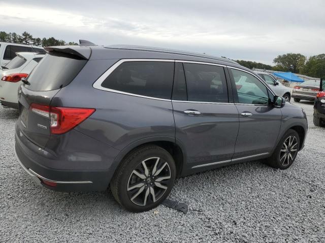 Photo 3 from auction – 2022 HONDA PILOT TOUR with VIN 5FNYF5H6XNB004136