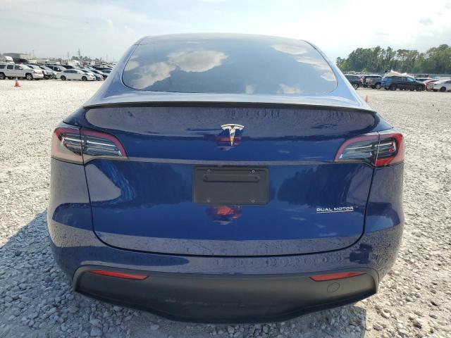 Photo 6 from auction – 2023 TESLA MODEL Y with VIN 7SAYGDEF1PF712342