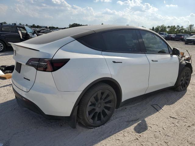 Photo 3 from auction – 2022 TESLA MODEL Y with VIN 7SAYGDEE8NF511039