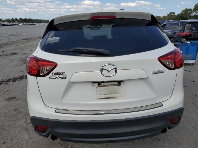 Photo 6 from auction – 2013 MAZDA CX-5 TOURI with VIN JM3KE2CE1D0135563