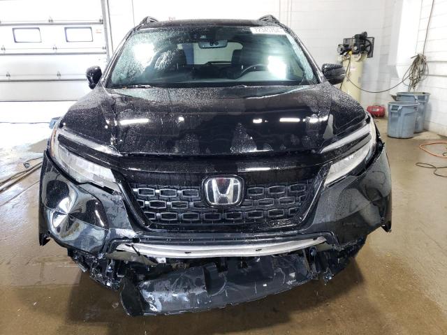 Photo 5 from auction – 2021 HONDA PASSPORT E with VIN 5FNYF8H04MB008565