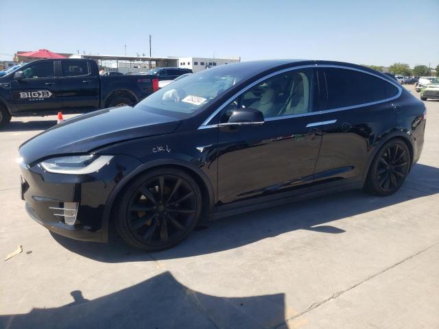 TESLA MODEL X 2018 with VIN 5YJXCBE2XJF111931 - Photo from auction