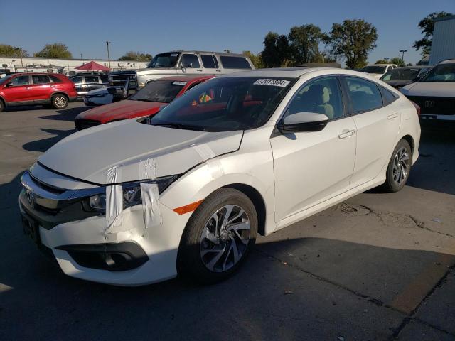 HONDA CIVIC EX 2018 with VIN 2HGFC2F86JH517716 - Photo from auction