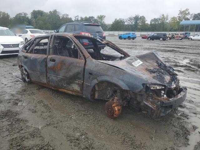 Photo 4 from auction – 2003 MAZDA PROTEGE PR with VIN JM1BJ245531212396