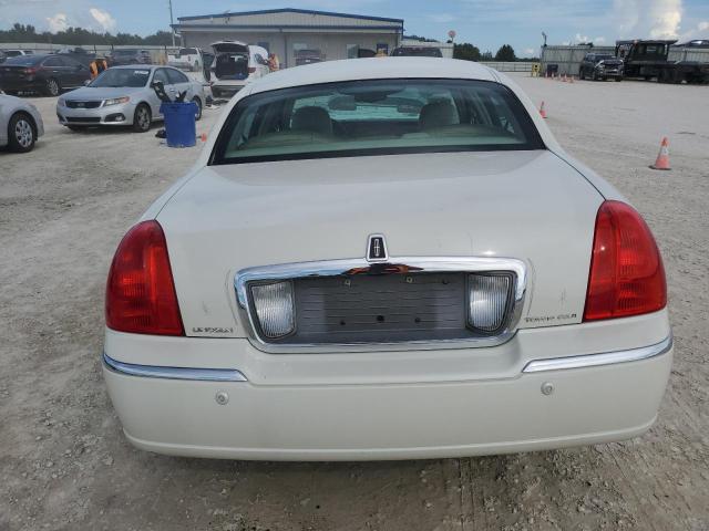 Photo 6 from auction – 2004 LINCOLN TOWN CAR U with VIN 1LNHM83W74Y640098