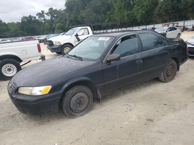 TOYOTA CAMRY CE 1997 with VIN 4T1BG22K2VU184576 - Photo from auction
